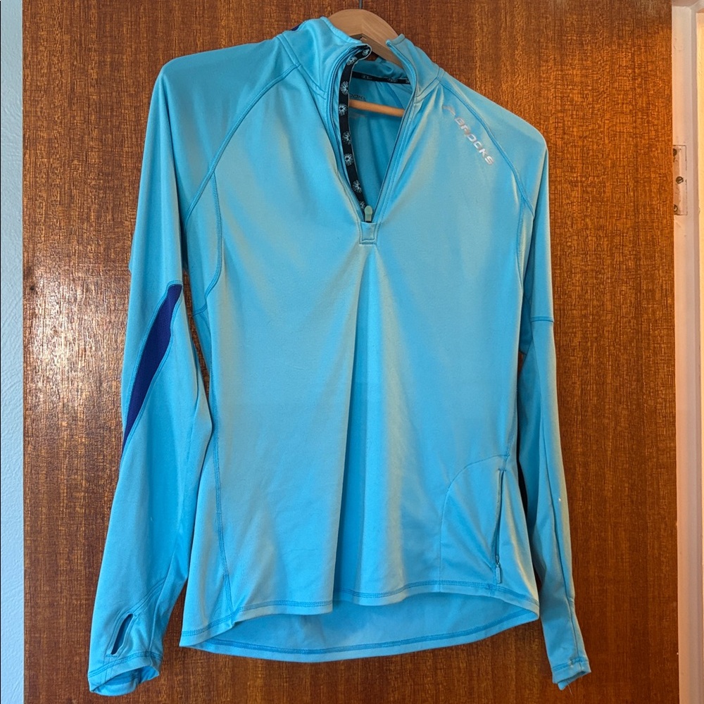 Brooks Sky Blue Performance Top with Dark Blue Trim and Thumbholes